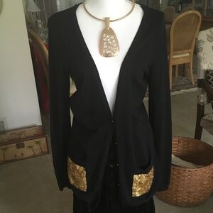 Festive black rayon blend size S sweater with patch pockets covered in sequins